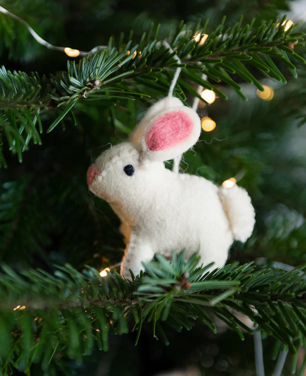 Hänge Kaninchen aus Filz in creme, 10 cm, als Deko fürs Kinderzimmer oder als Weihnachtsschmuck