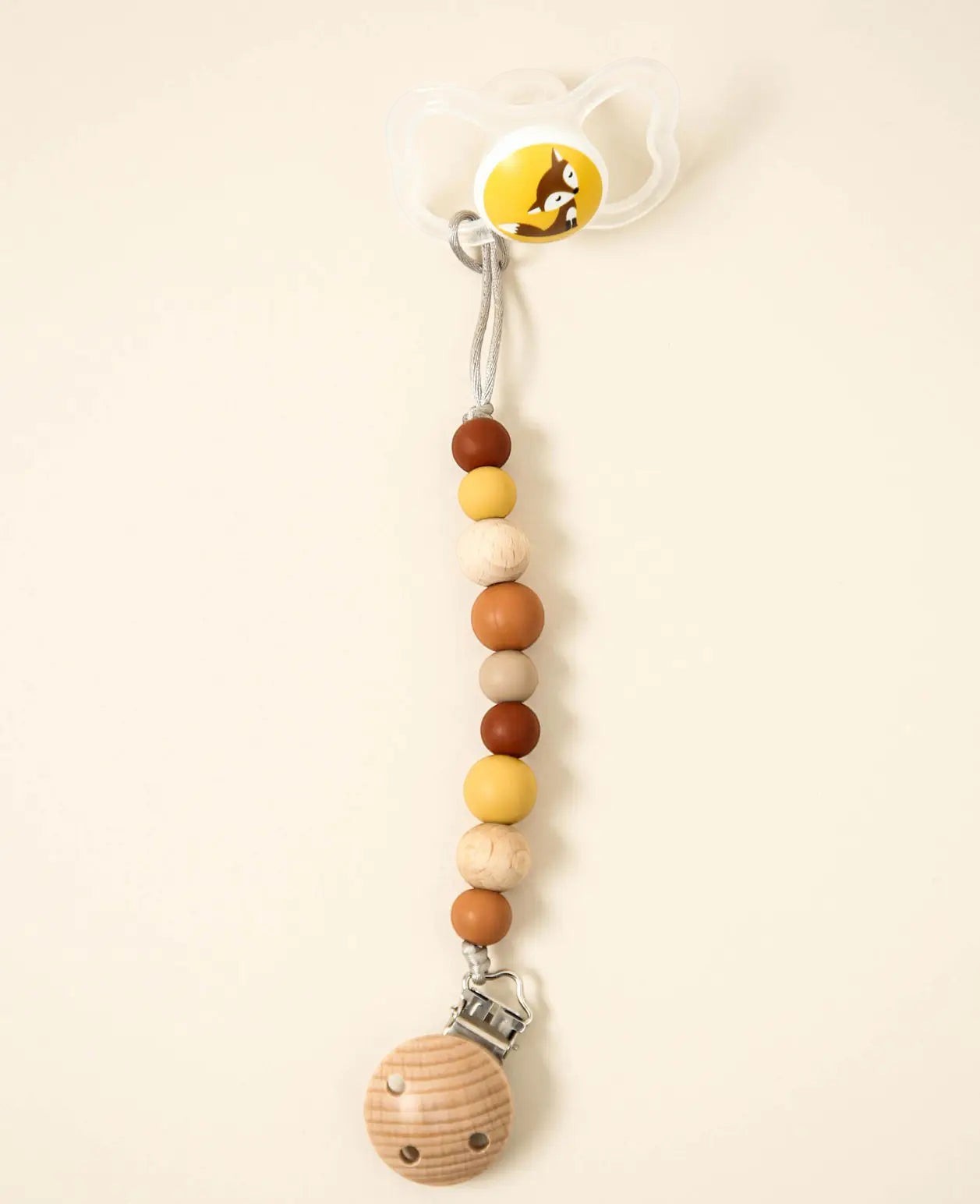 Nuggikette / Schnullerkette "Sienna" in Gelb- /Rottönen, aus Holz und Silikon, 23 cm
