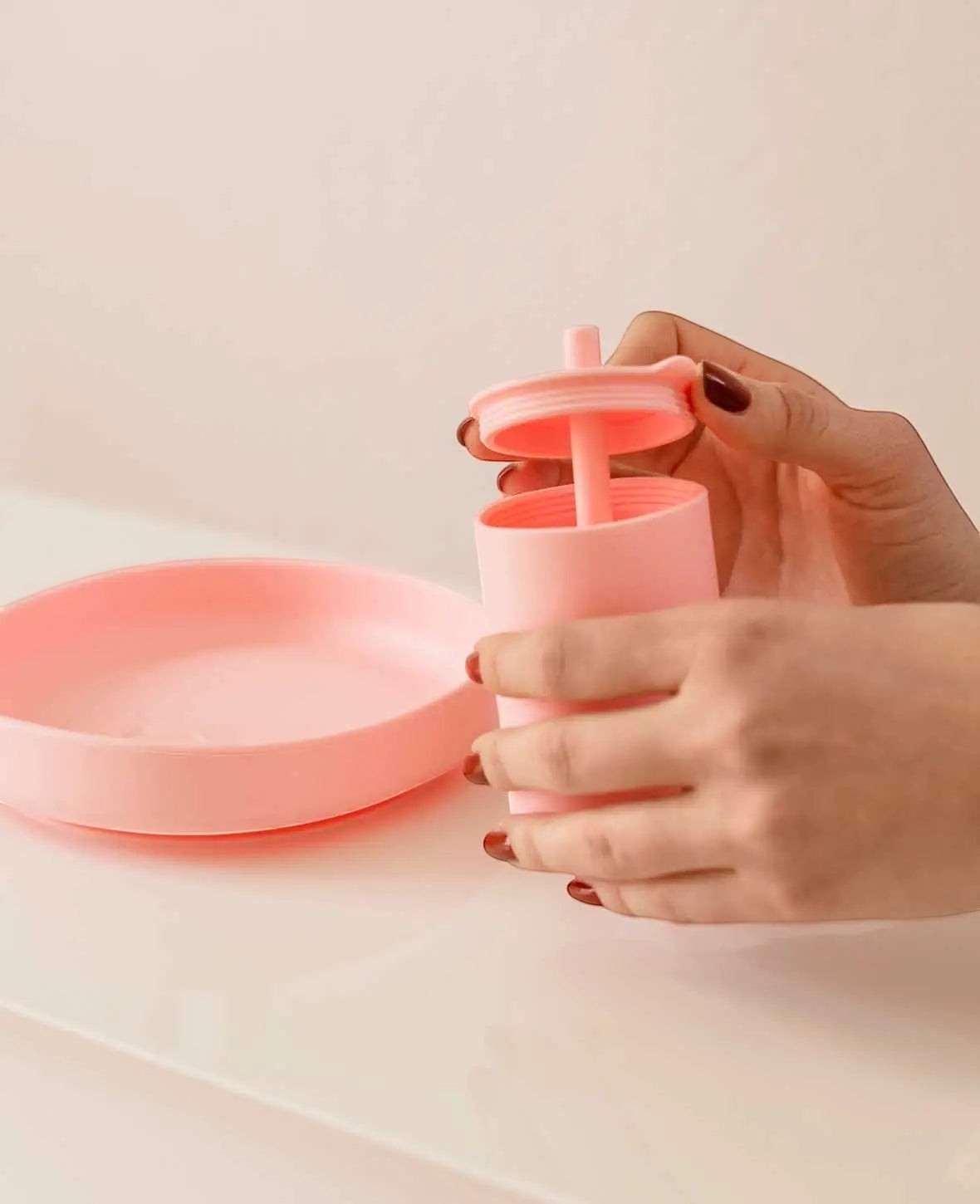 Trinkbecher mit Strohhalm für Kinder in rosa aus Silikon, 200 ml
